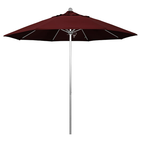 A California Umbrella with a silver metal pole and burgundy canopy.
