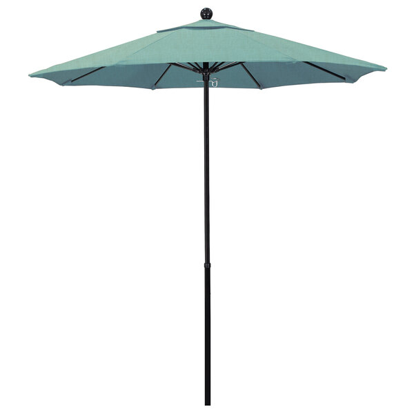 A blue California Umbrella with a Sunbrella Spa canopy on a black pole.