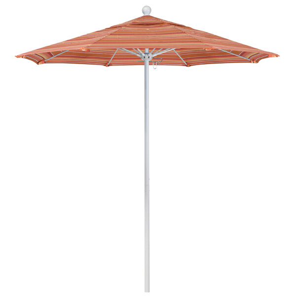 A close-up of a striped California Umbrella on a white pole with orange and white striped canopy.