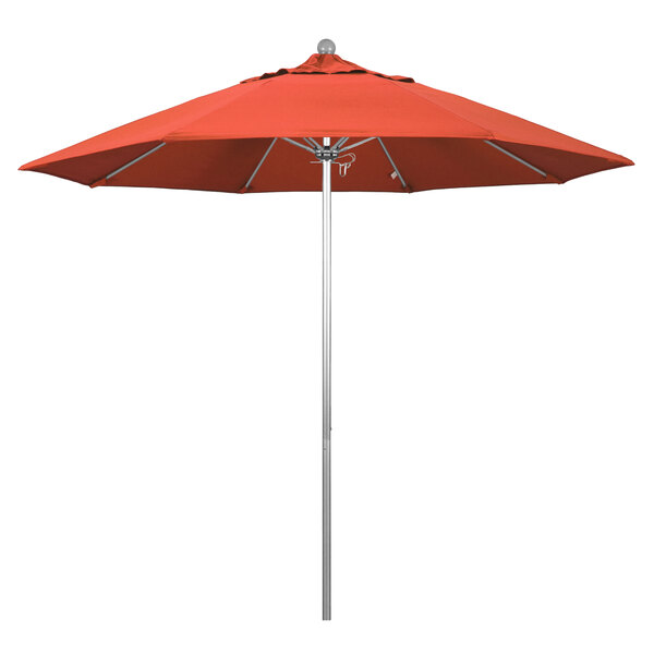 A red California Umbrella with a sunset fabric canopy on a silver aluminum pole.