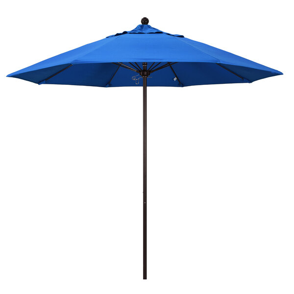 A blue umbrella with a bronze metal pole on a white background.