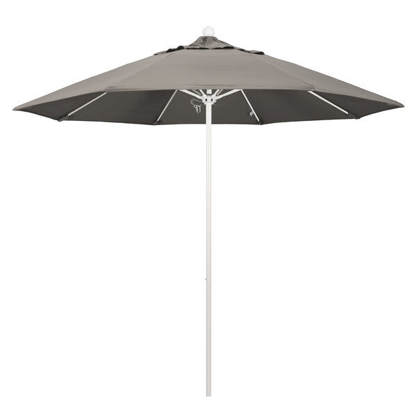 A gray California Umbrella with a white pole.
