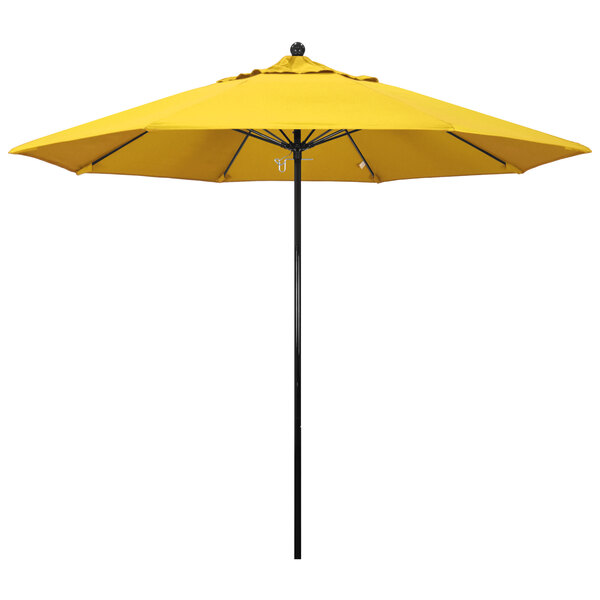 A close up of a California Umbrella with a yellow canopy and black pole.