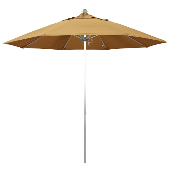 A California Umbrella ALTO round outdoor umbrella with a wheat Sunbrella canopy on a silver aluminum pole.