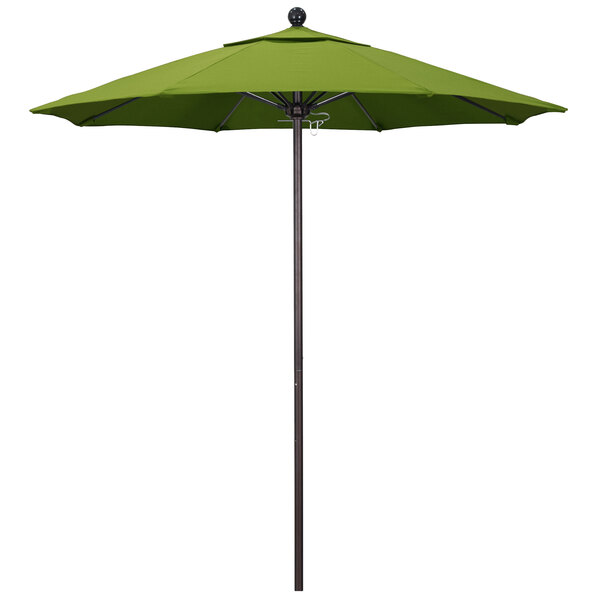 A green California Umbrella with a bronze pole and Macaw Sunbrella canopy.
