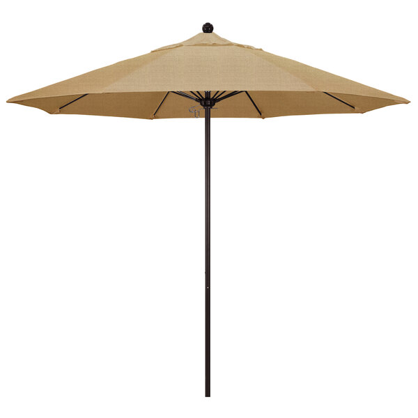 A California Umbrella ALTO round outdoor umbrella with a bronze pole and tan Sunbrella canopy.