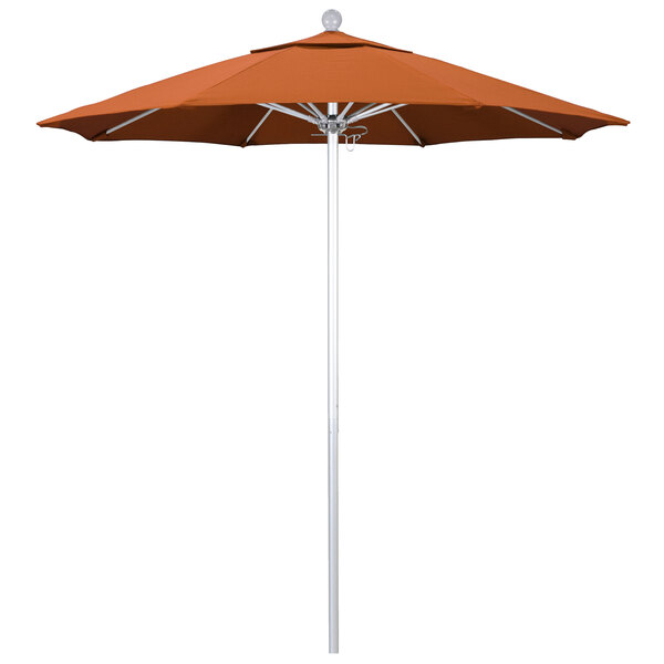 A California Umbrella ALTO round outdoor umbrella with orange Sunbrella fabric on a white pole.