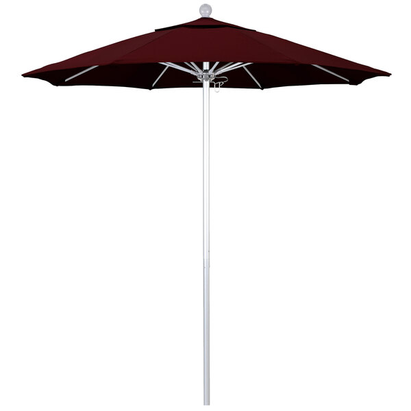 A close-up of a California Umbrella with a maroon canopy and silver pole.