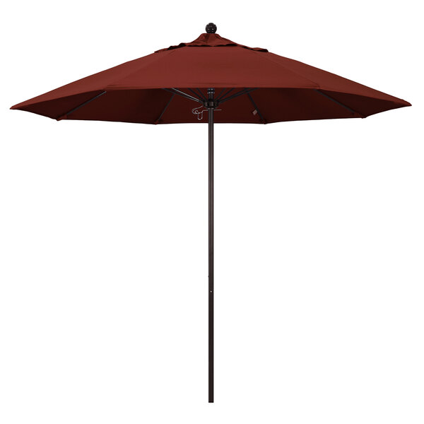 A red California Umbrella ALTO 9' round umbrella with Sunbrella Henna fabric on a bronze pole.