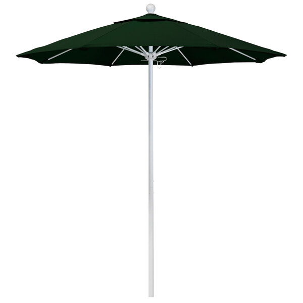 A California Umbrella with a Pacifica canopy and Hunter Green fabric on a white pole.