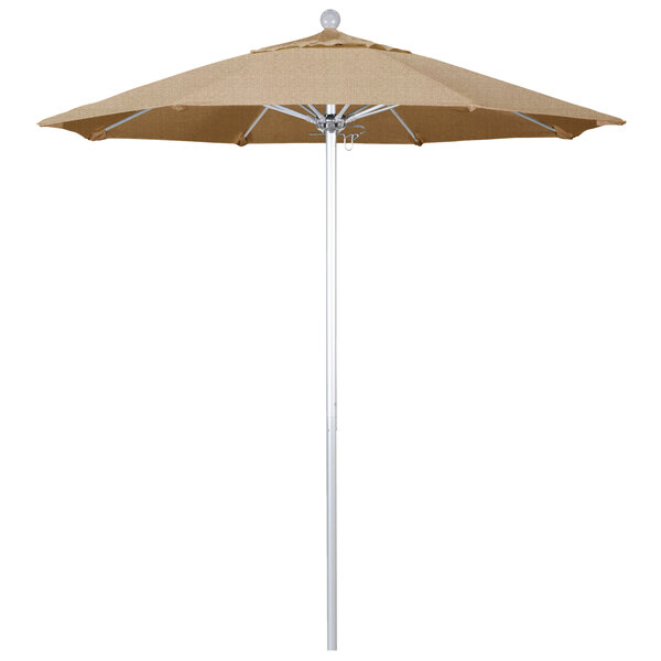 A tan California Umbrella with a Sunbrella Linen Sesame canopy.