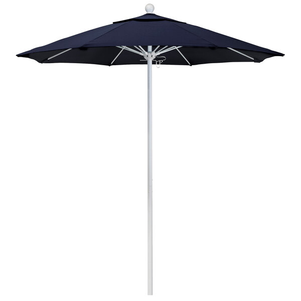 A navy blue California Umbrella with a white pole.