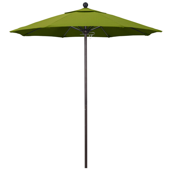A kiwi green California Umbrella on a bronze pole.