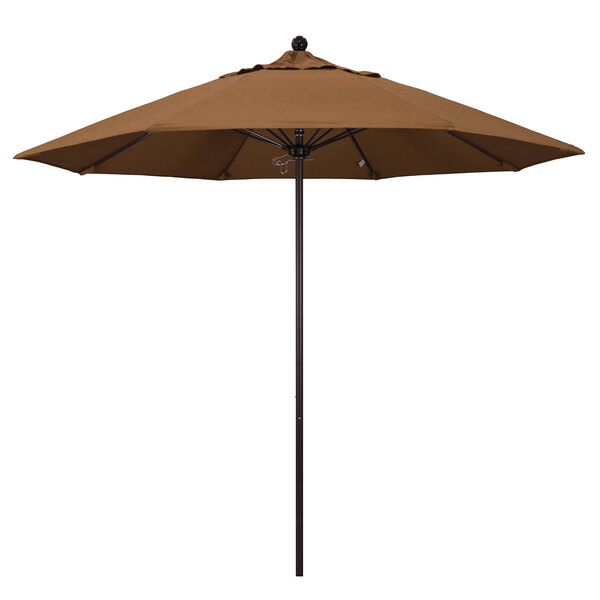 A close-up of a brown California Umbrella with a bronze pole.