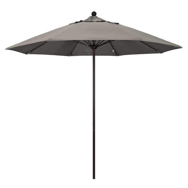 A California Umbrella ALTO 9' round umbrella with a bronze pole and taupe canopy.