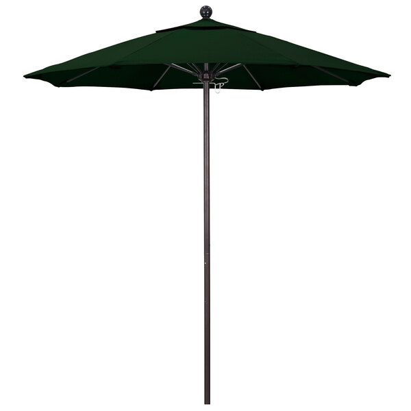 A California Umbrella with a Hunter Green Canopy on a Bronze Pole.