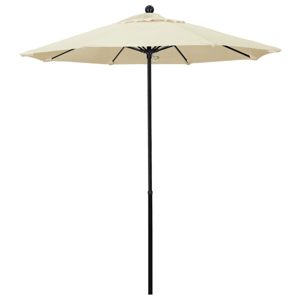 A white California Umbrella with a Sunbrella Oceanside canopy on a black pole.