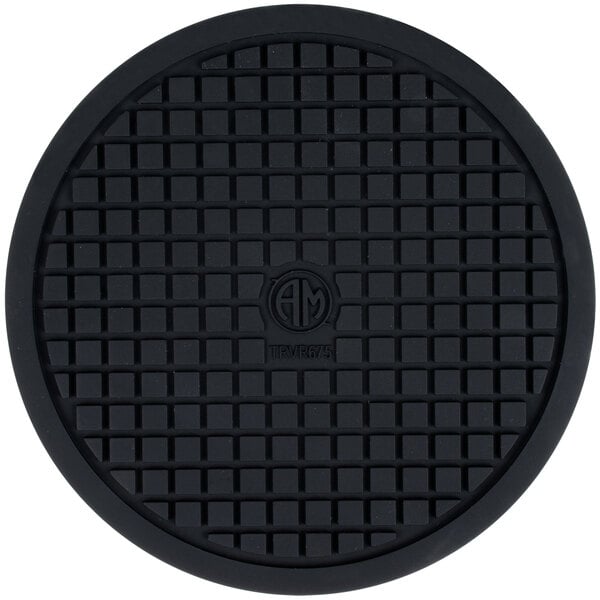 A black round silicone trivet with a square pattern.
