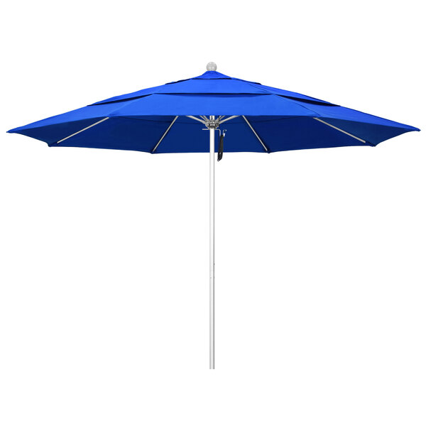 A close-up of a California Umbrella with a blue Sunbrella canopy.