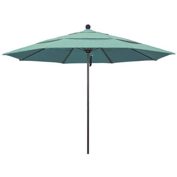 A close-up of a green California Umbrella with a bronze pole and Spectrum Mist canopy.