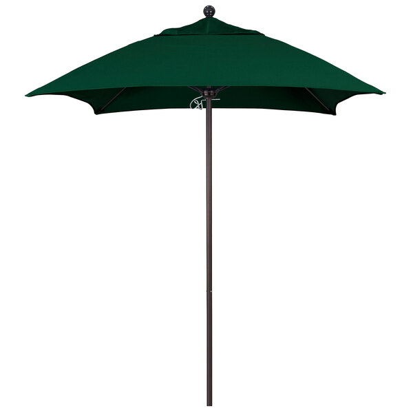 A forest green California Umbrella on a bronze aluminum pole.
