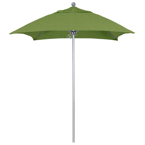 A California Umbrella with a green Sunbrella canopy on a silver metal pole.