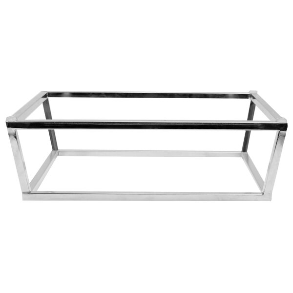 A stainless steel Tablecraft short half size reversible riser on a metal shelf.