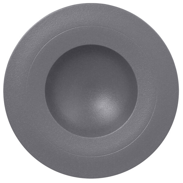 A close-up of a grey circular RAK Porcelain deep plate.