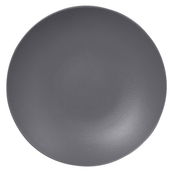 A close-up of a stone gray RAK Porcelain deep coupe plate.