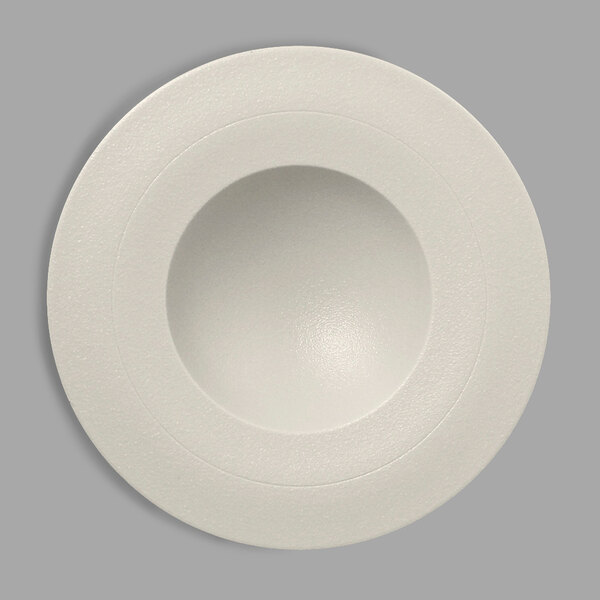 A white porcelain plate with a round center.