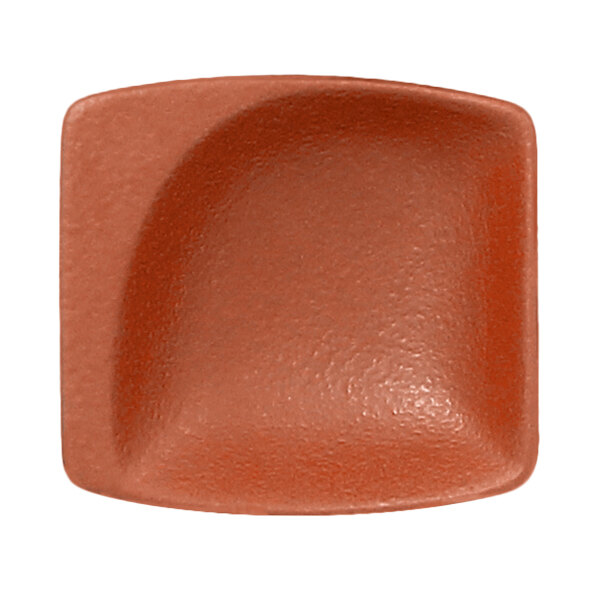 A brown square RAK Porcelain mini dish with a curved edge.