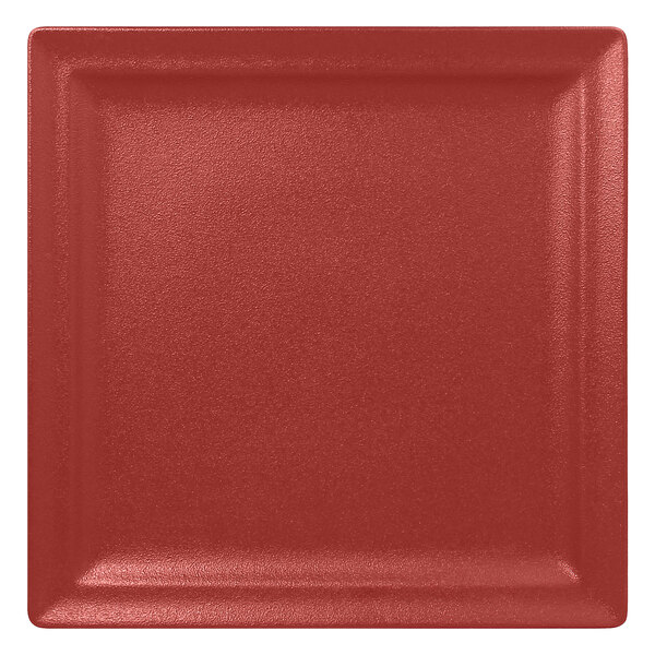 A RAK Porcelain Neo Fusion Magma Dark Red square plate with a square edge.