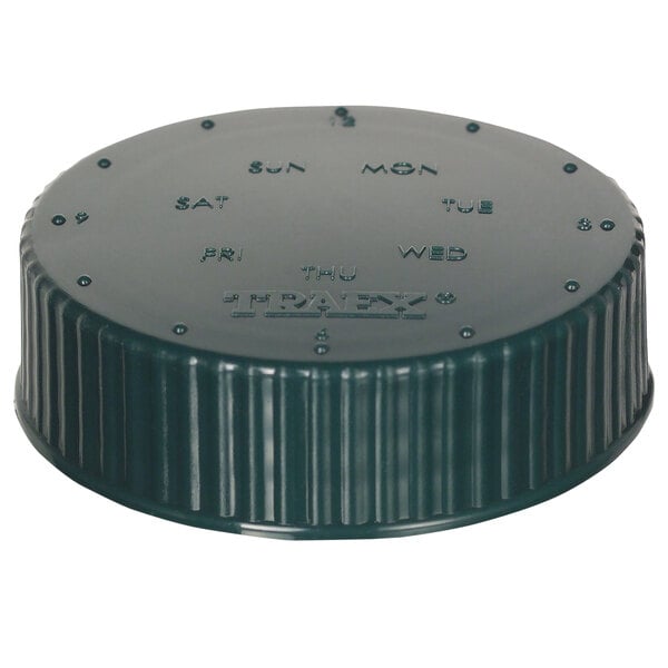 A green plastic Vollrath Dripcut lid with a date indicator on it.