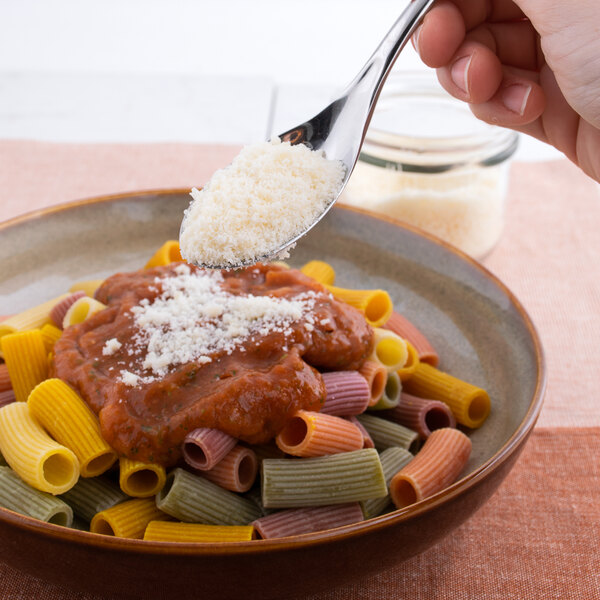 A spoonful of pasta with Speciale grated Romano cheese.