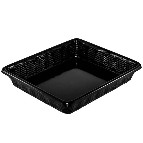 A black Marco Company plastic basket tray without holes on a table.