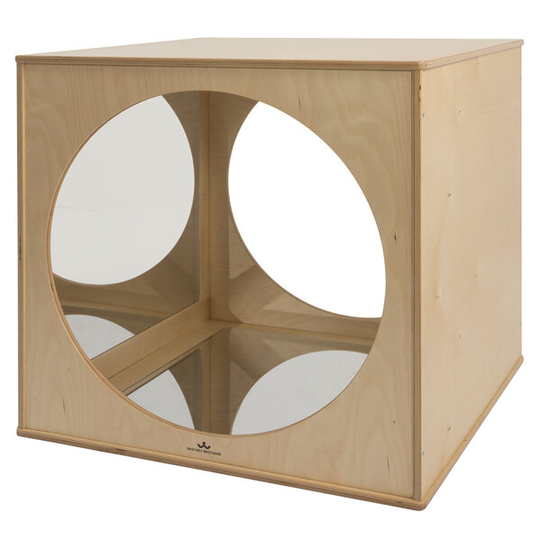 A Whitney Brothers children's wooden play house cube with a circular window.