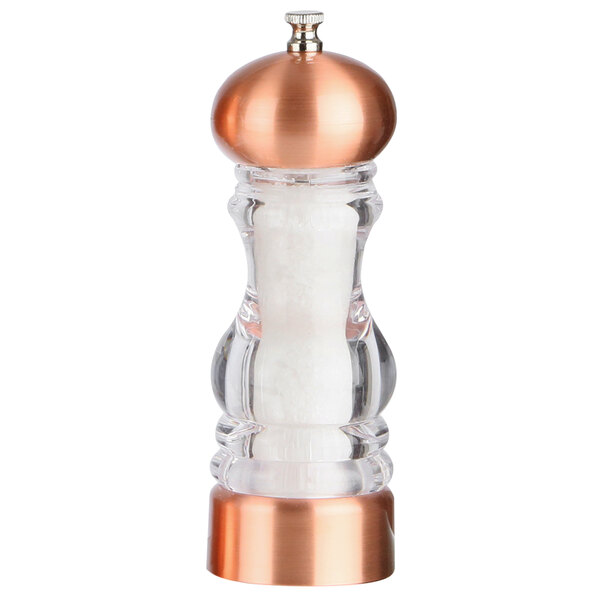 A Chef Specialties rose gold salt mill with a copper top.