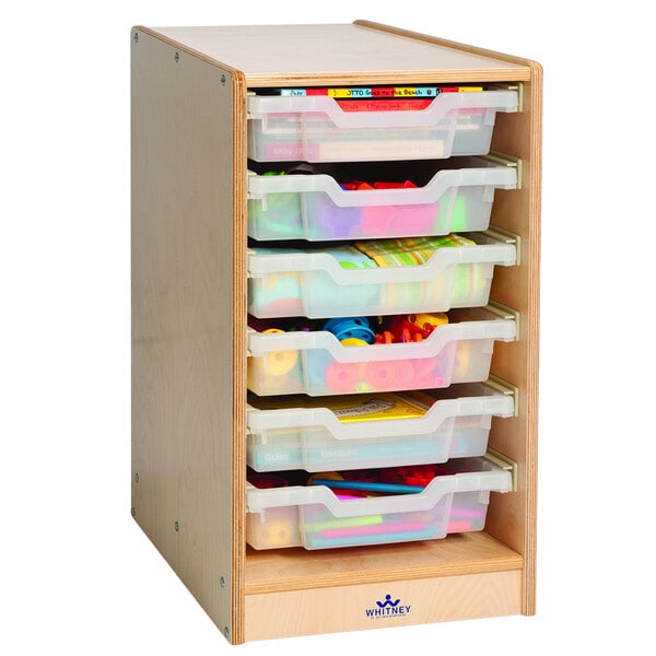 A Whitney Brothers wooden storage cabinet with six plastic bins.