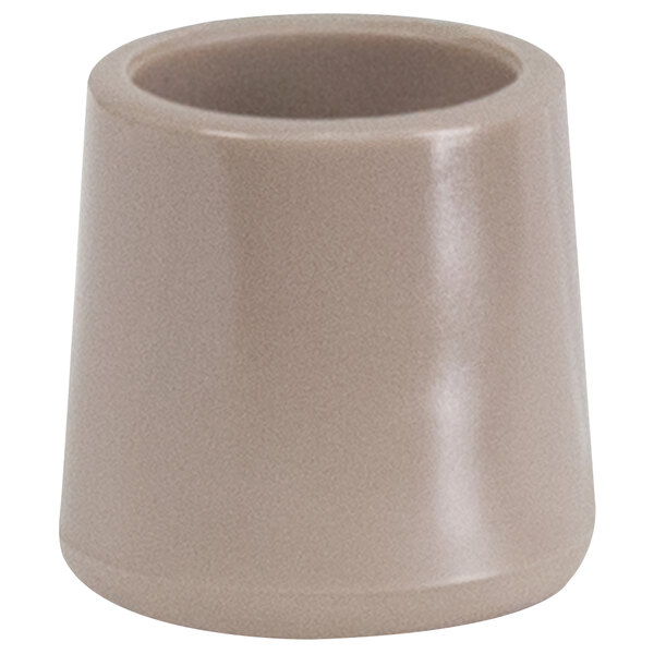 A beige cylindrical foot cap for chairs.