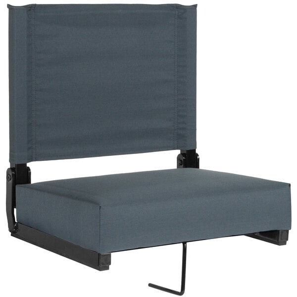 A Flash Furniture Grandstand Dark Blue ultra-padded stadium chair with a black frame.