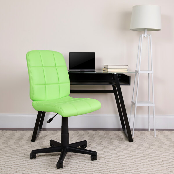 A green Flash Furniture mid-back office chair next to a black desk.