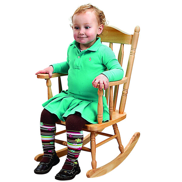 A child sitting in a Whitney Brothers child's rocking chair.
