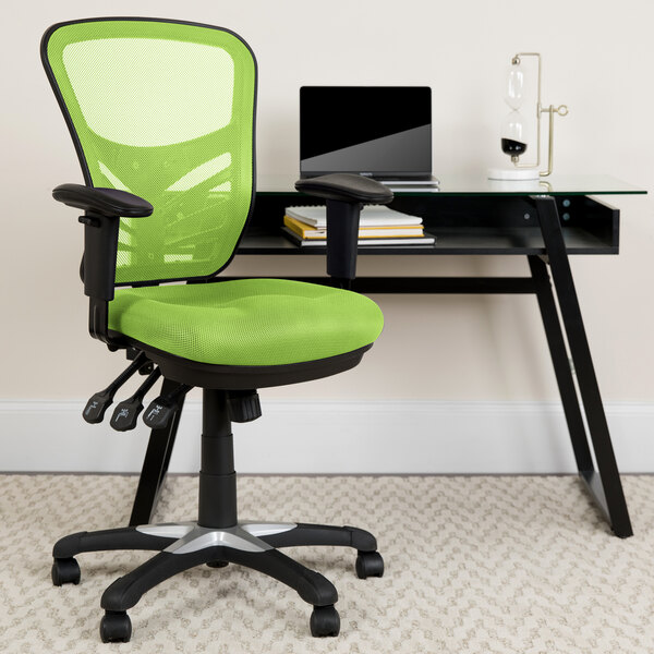 A Flash Furniture green mesh office chair next to a black desk.
