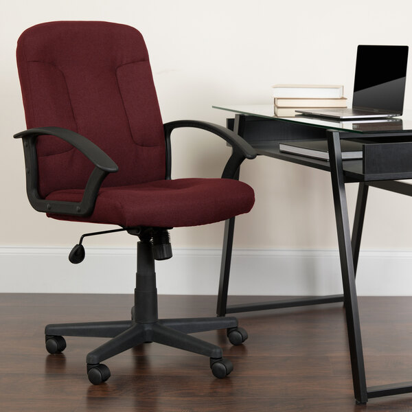 A Flash Furniture burgundy office chair with black armrests.