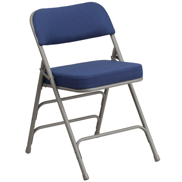 A navy blue Flash Furniture metal folding chair.