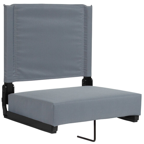 A grey Flash Furniture Grandstand comfort seat with a black frame.