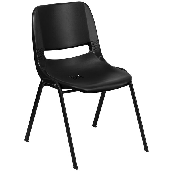 A black Flash Furniture ergonomic shell stack chair with metal legs.