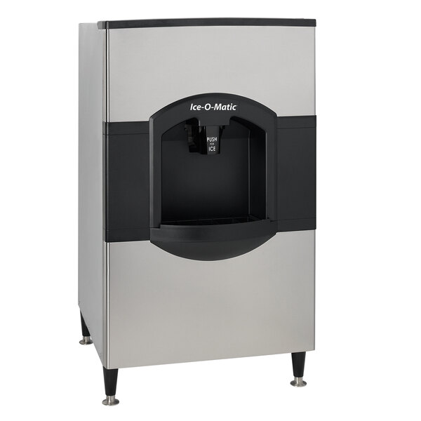 A silver and black Ice-O-Matic ice and water dispenser.
