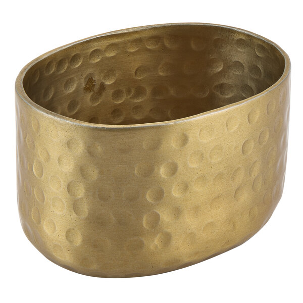 An American Metalcraft gold hammered aluminum sugar packet holder with a textured oval surface.