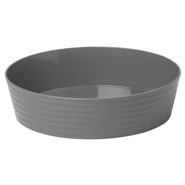 An American Metalcraft Del Mar gray plastic serving bowl with wavy lines on the rim.